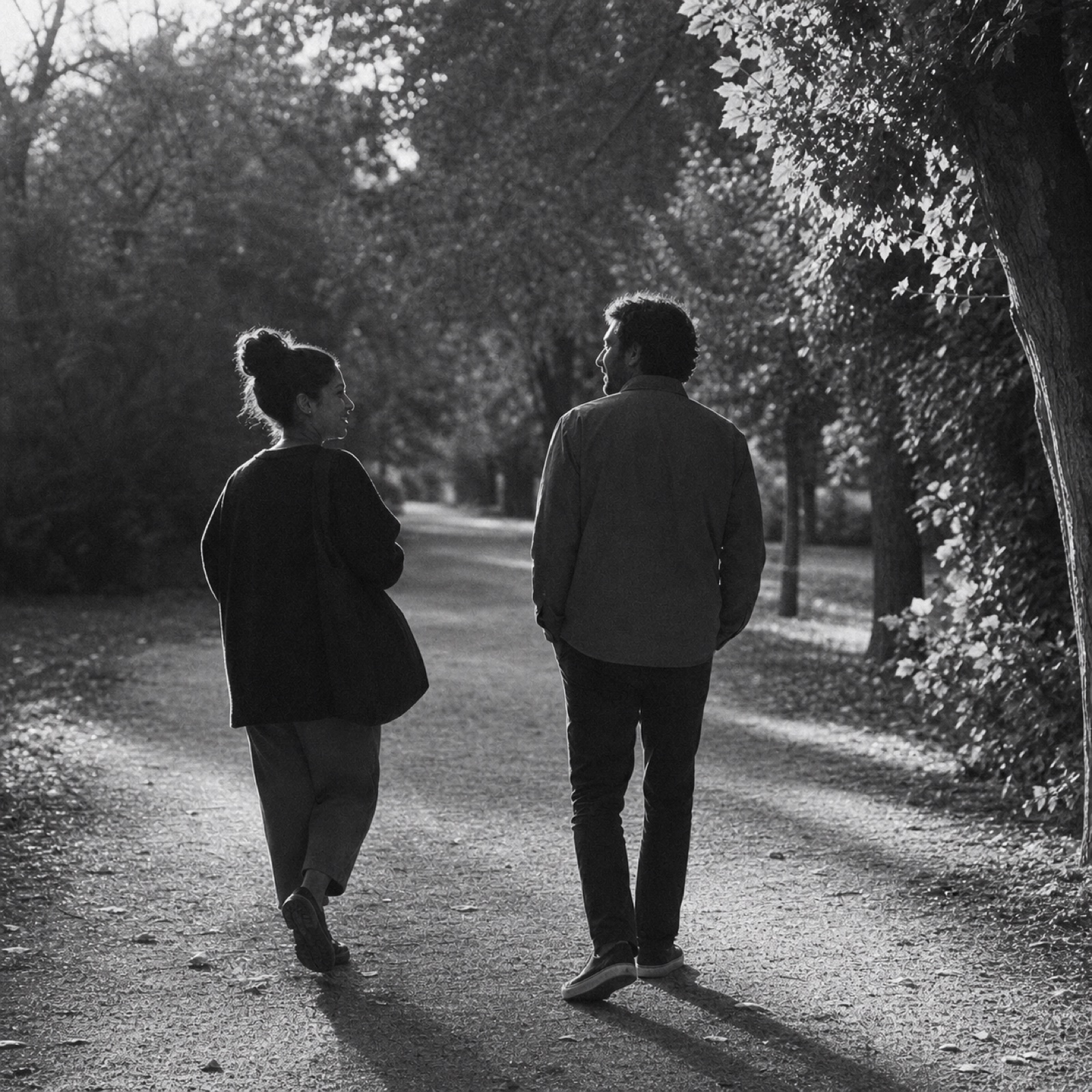 A person walking, mid-stride, toward the next thing
